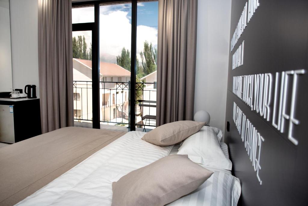 Postel nebo postele na pokoji v ubytování Maison