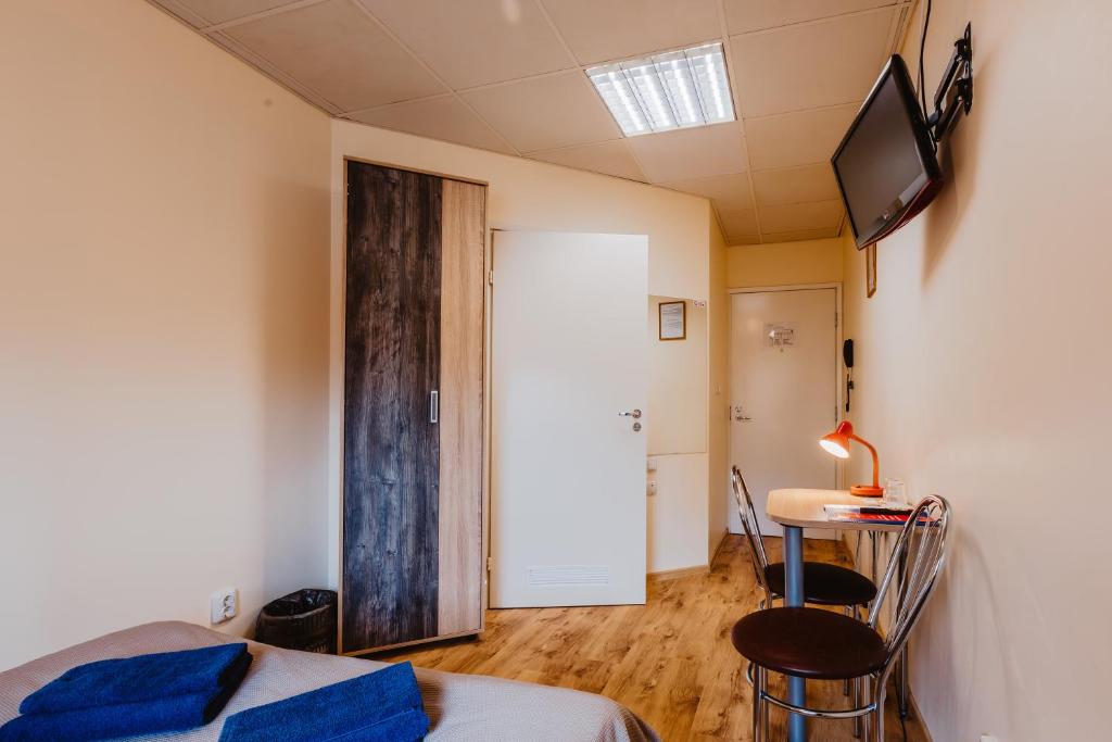 TV a/nebo společenská místnost v ubytování Aleksandri Hotel