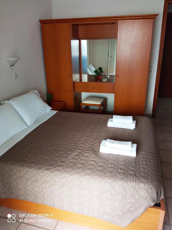 Postel nebo postele na pokoji v ubytování Agios Georgios - 2 Beds - Sleeps 5 - Free Parking