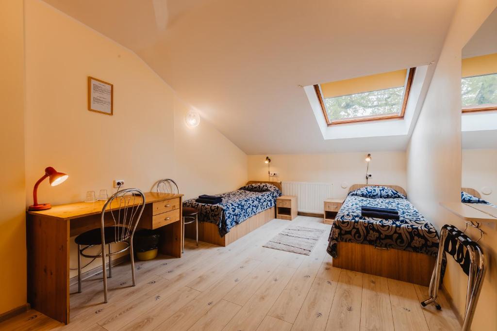 Postel nebo postele na pokoji v ubytování Aleksandri Hotel