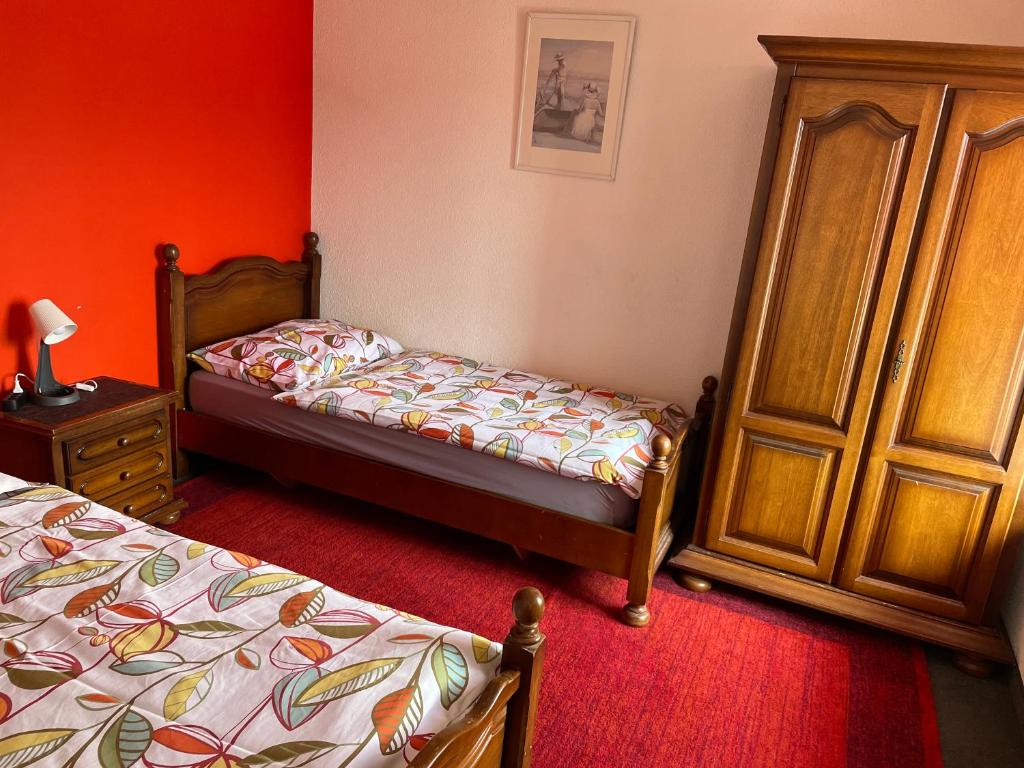 Postel nebo postele na pokoji v ubytování Le Bras d'Or