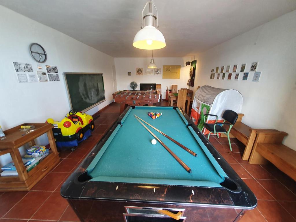 a living room with a pool table in it at Villa Lola - Casa con Futbolín-Billar-Diana - 6pax in Gijón
