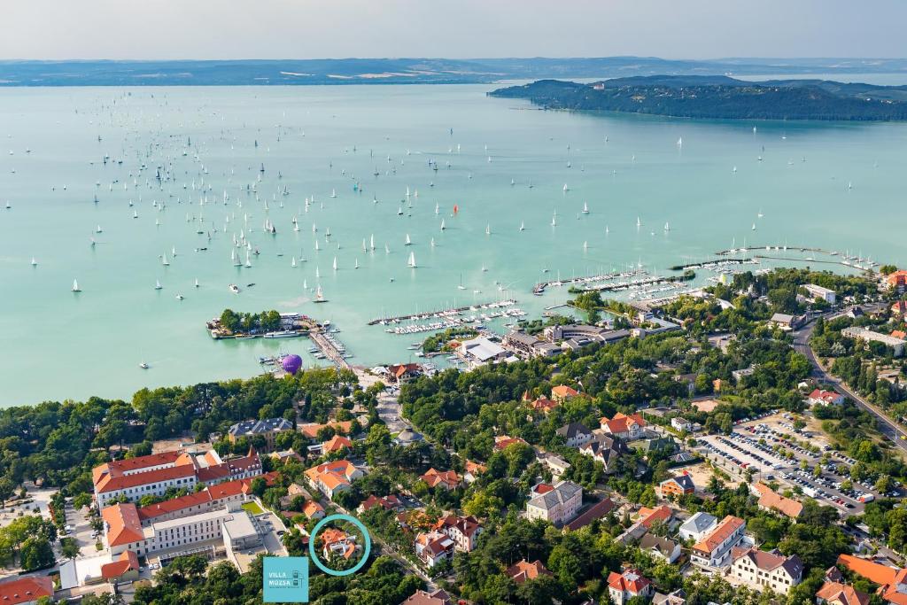 an aerial view of a harbor with boats in the water at Villa Muzsa Deluxe in Balatonfüred