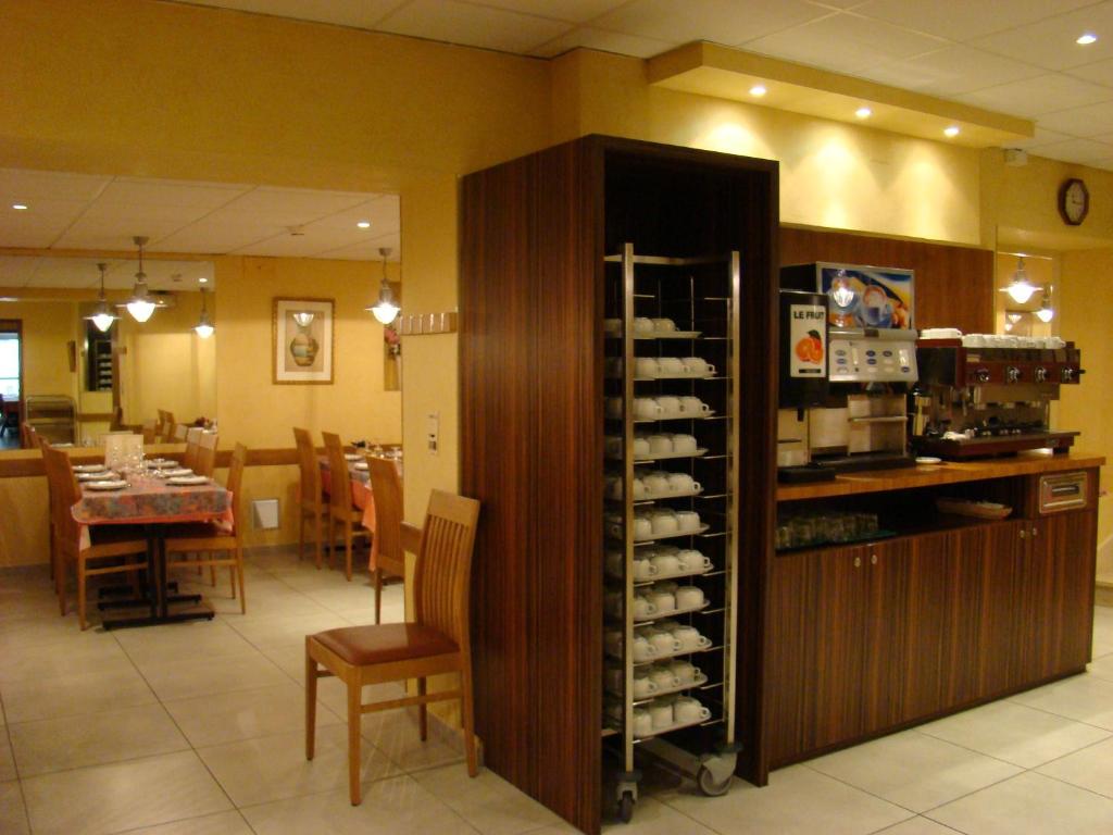 Restaurace v ubytování Hôtel Saint Sébastien