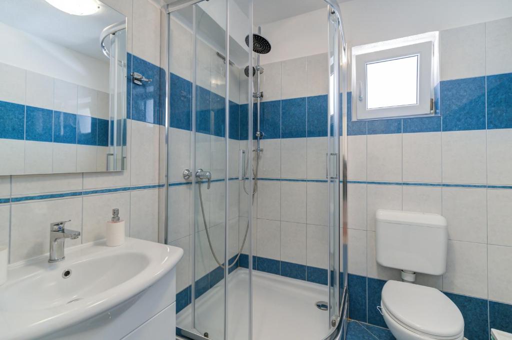 Koupelna v ubytování Apartments Antic