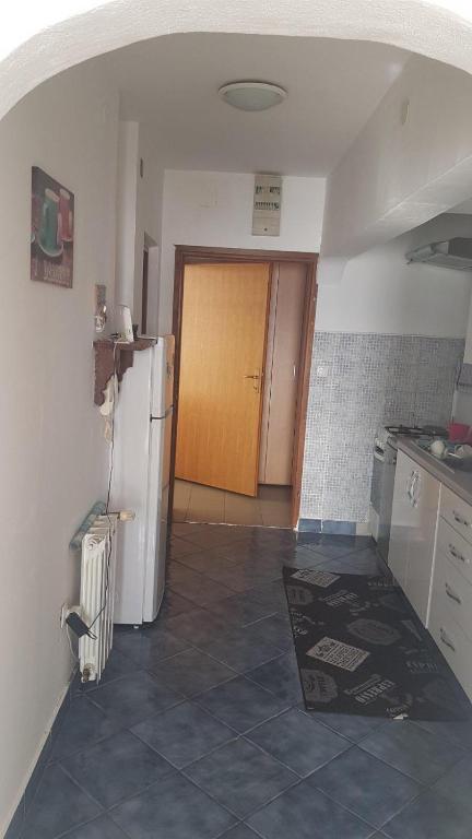 Kuchyň nebo kuchyňský kout v ubytování Apartment TIM
