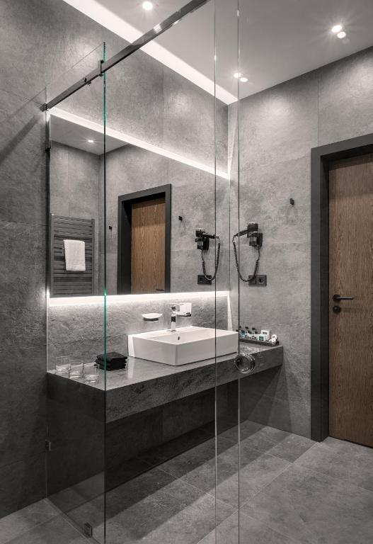Koupelna v ubytování Hotel Raymond