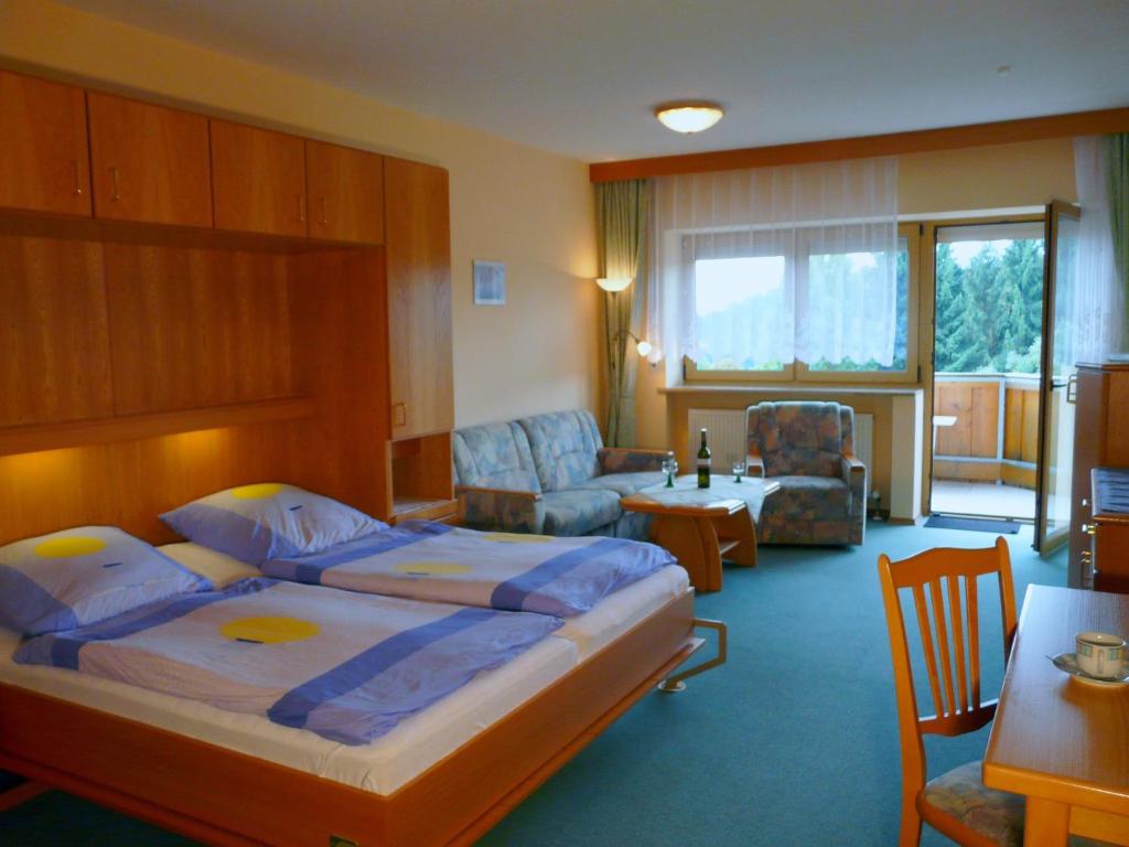 Postel nebo postele na pokoji v ubytování Gästeappartements Sonnenland