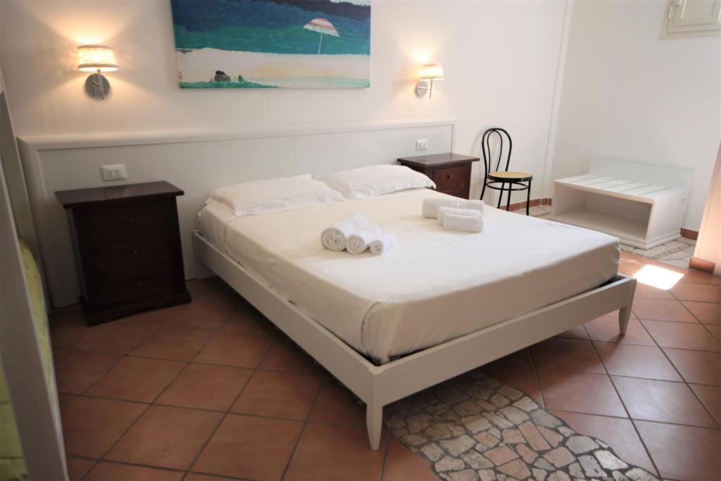 Postel nebo postele na pokoji v ubytování Solaris Guesthouse