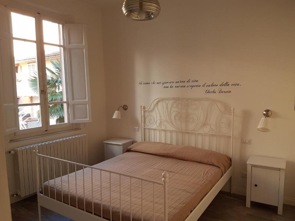 Posteľ alebo postele v izbe v ubytovaní LA CASINA DEL NONNO GINO, TRANQUILLO CON TERRAZZA ESClUSIVA