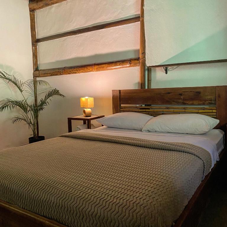 Postel nebo postele na pokoji v ubytování Cinnamon House
