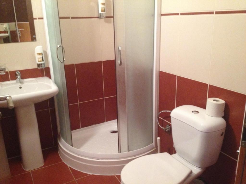 Koupelna v ubytování Garni Hotel Cosmopolitan