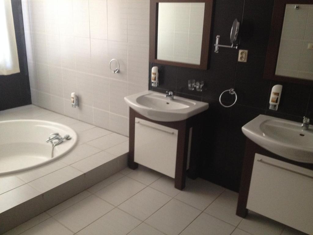 Koupelna v ubytování Garni Hotel Cosmopolitan