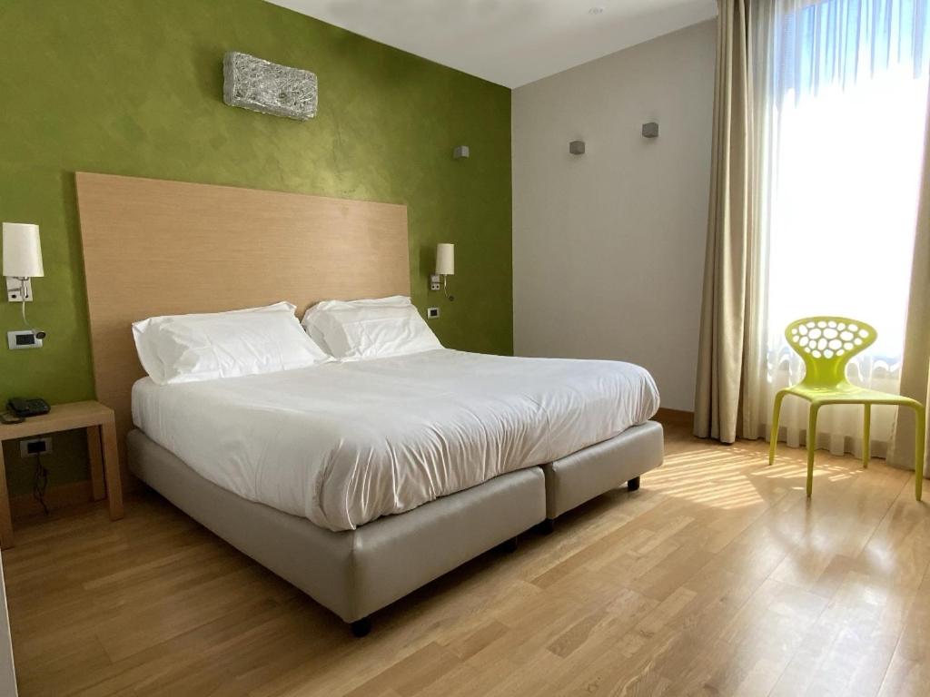 Postel nebo postele na pokoji v ubytování Atlantic Park Hotel