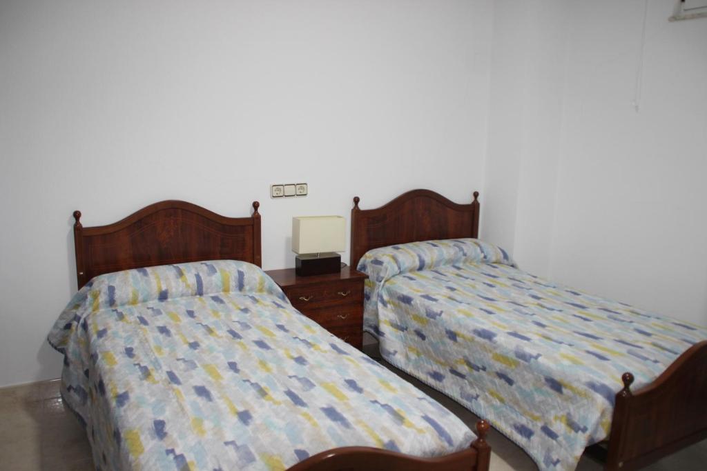 Posteľ alebo postele v izbe v ubytovaní LA CASA DEL ESTANCO