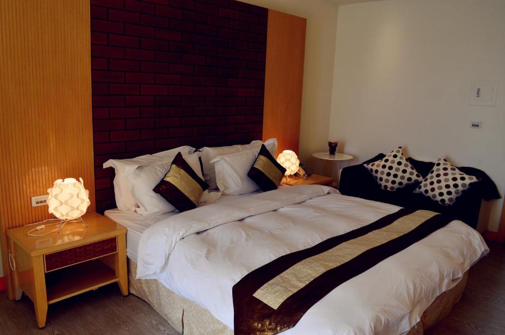 Postel nebo postele na pokoji v ubytování Yake Homestay