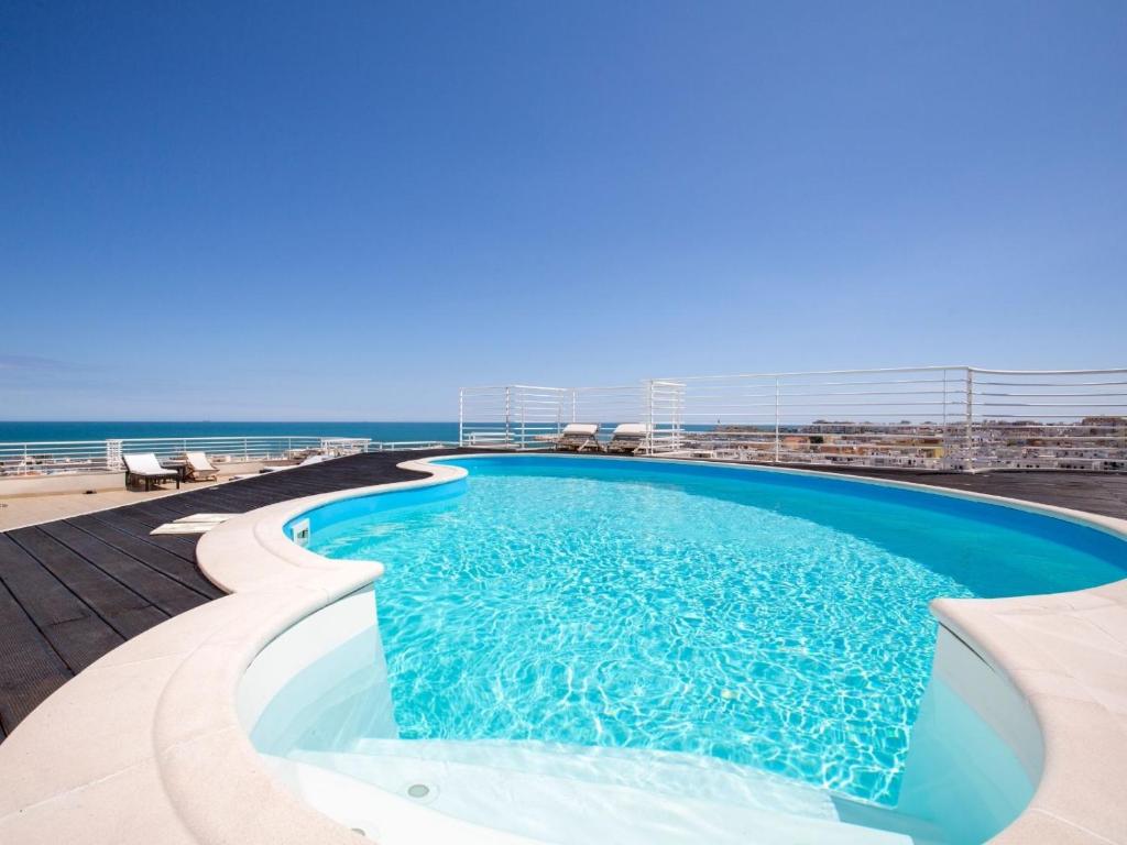 a swimming pool on the deck of a cruise ship at Navicri B&B in Vieste