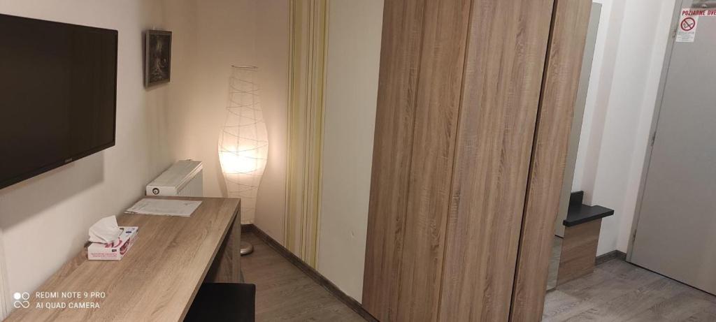 TV a/nebo společenská místnost v ubytování TaM Autohof Malacky