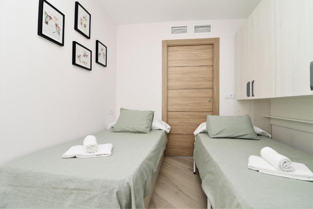 Posteľ alebo postele v izbe v ubytovaní Don Miguel 2-A Apartment Levante Beach