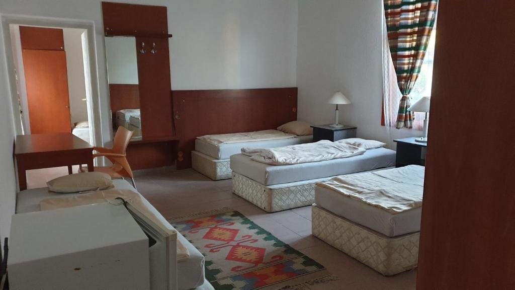 Postel nebo postele na pokoji v ubytování Aqua Hostel