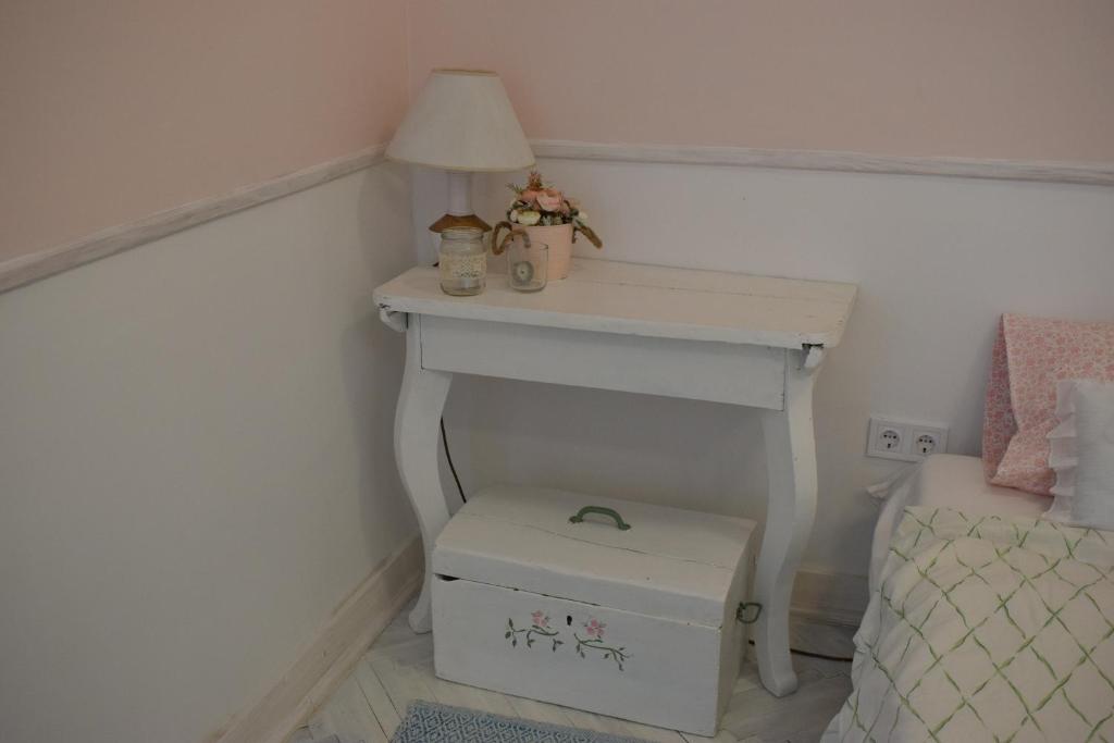 Łóżko lub łóżka w pokoju w obiekcie Malomszeg Apartman 2