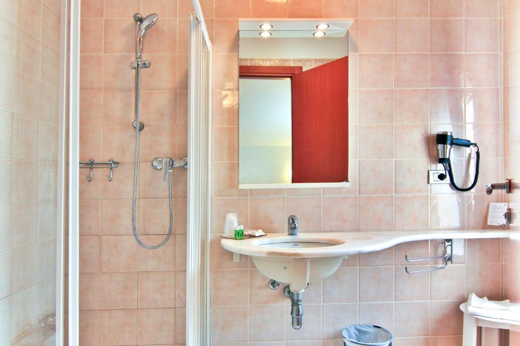 Kúpeľňa v ubytovaní Hotel La Perla