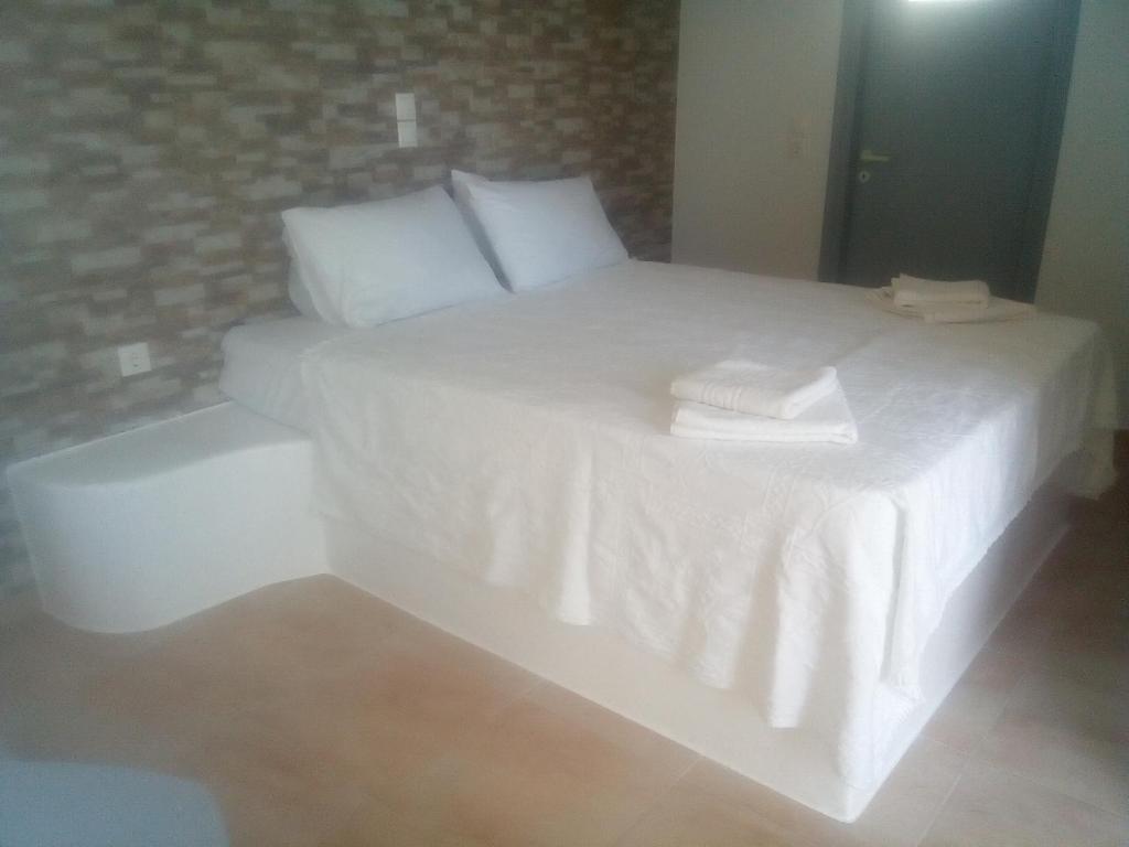 Postel nebo postele na pokoji v ubytování Maistrali Studios & Apartments