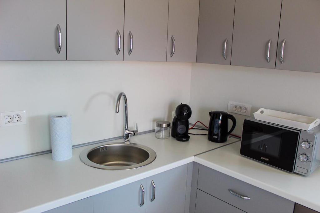 Kuchnia lub aneks kuchenny w obiekcie Apartmani Manuela
