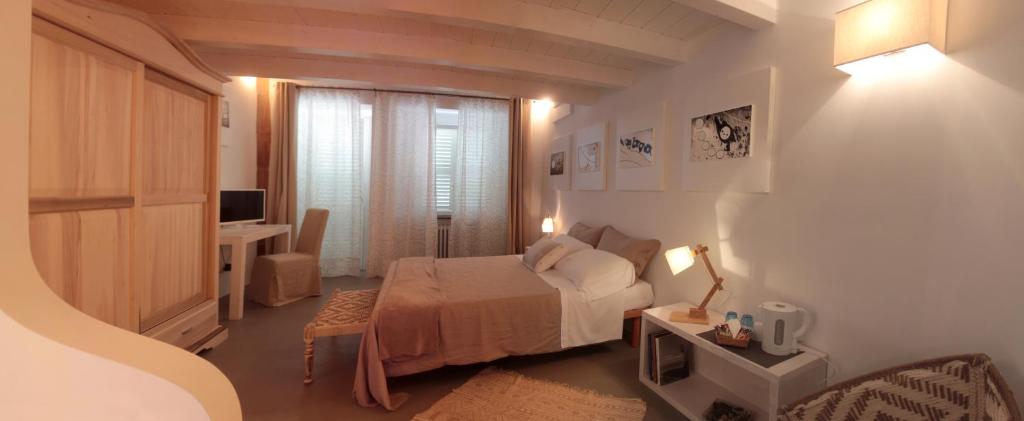 Posteľ alebo postele v izbe v ubytovaní Relais Chambre
