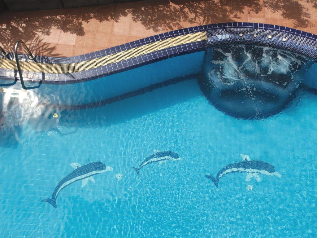 Der Swimmingpool an oder in der Nähe von Kata Sea View Villas