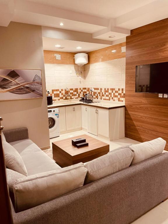 TV a/nebo společenská místnost v ubytování Quartz Executive Hotel
