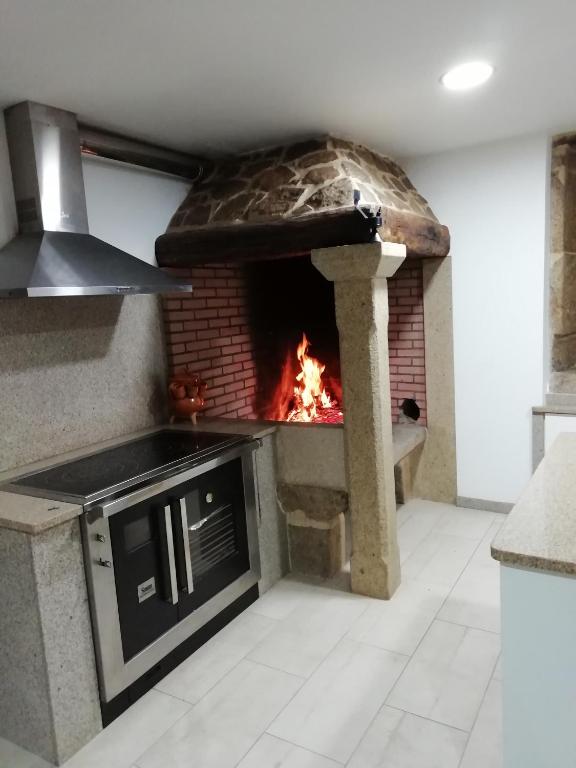 Kuchyň nebo kuchyňský kout v ubytování BUELIÑA DA CARBALLEIRA