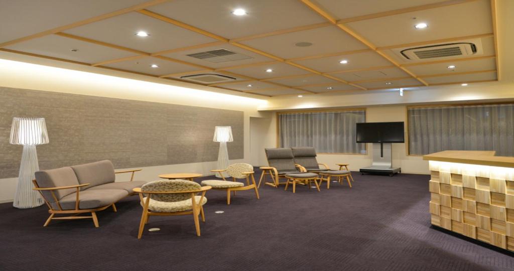 TV a/nebo společenská místnost v ubytování Kyoto Hot Spring Hatoya Zuihokaku Hotel