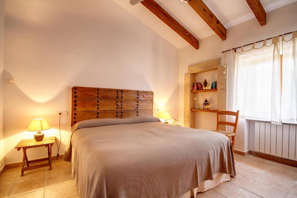 Postel nebo postele na pokoji v ubytování Finca Agroturismo Can Carro