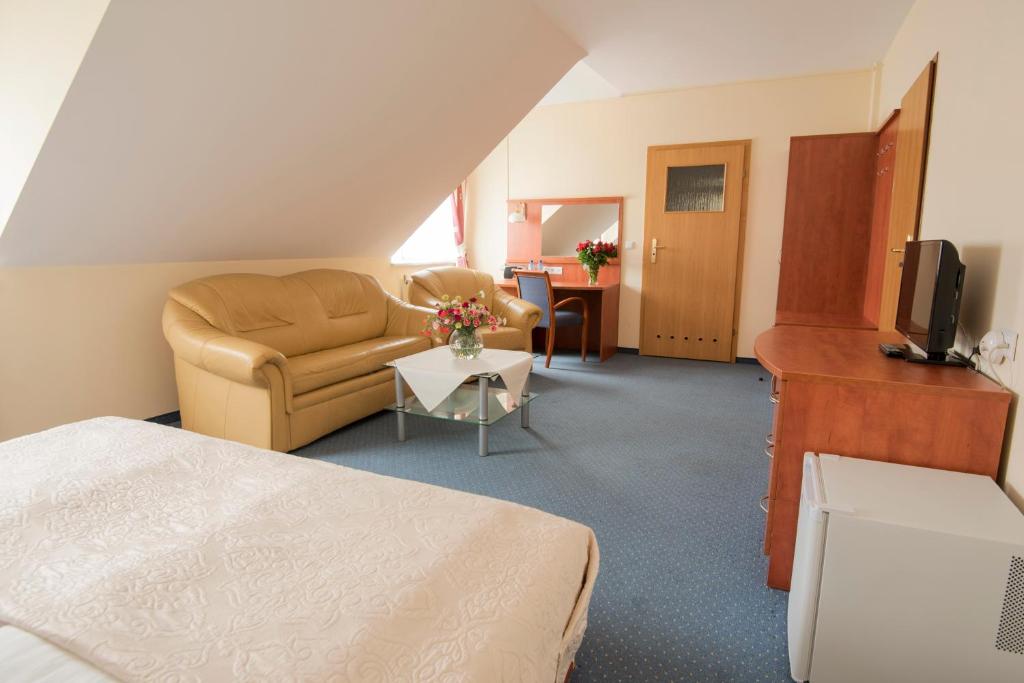 Kuchyň nebo kuchyňský kout v ubytování Hotel Daria