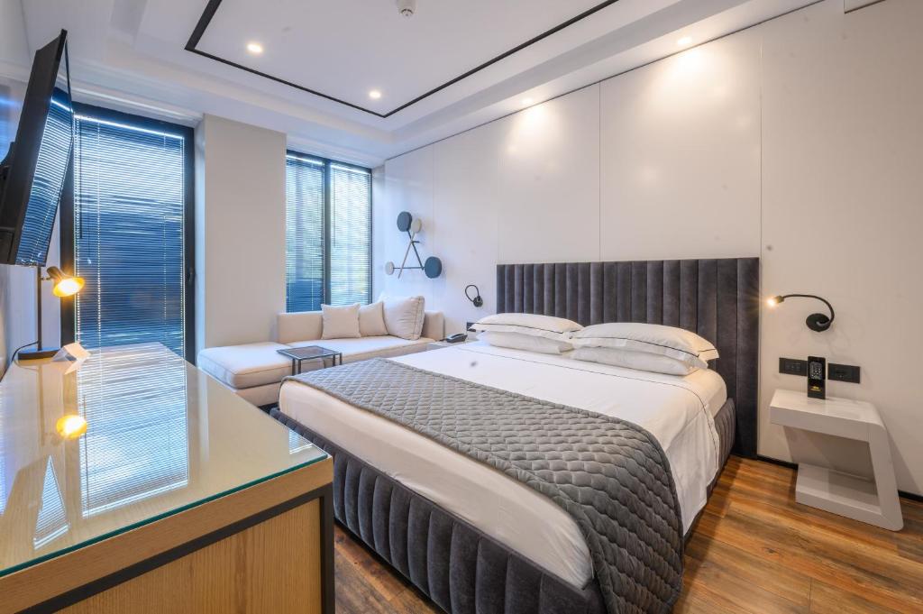 Postel nebo postele na pokoji v ubytování Miamar Luxury Hotel & Spa