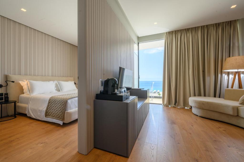 Postel nebo postele na pokoji v ubytování Miamar Luxury Hotel & Spa