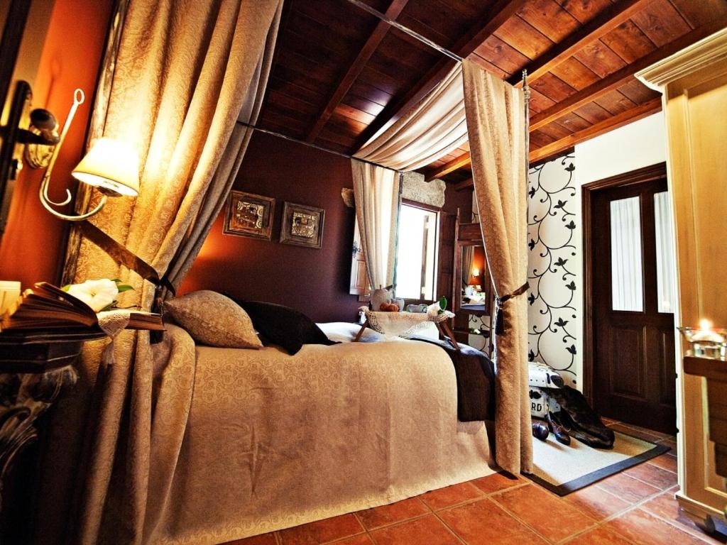 Postel nebo postele na pokoji v ubytování Casa da Muiñeira
