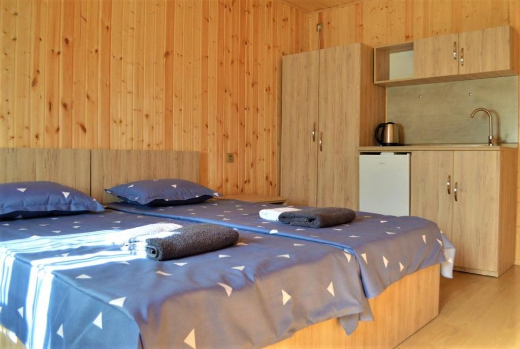 Postel nebo postele na pokoji v ubytování SHODA