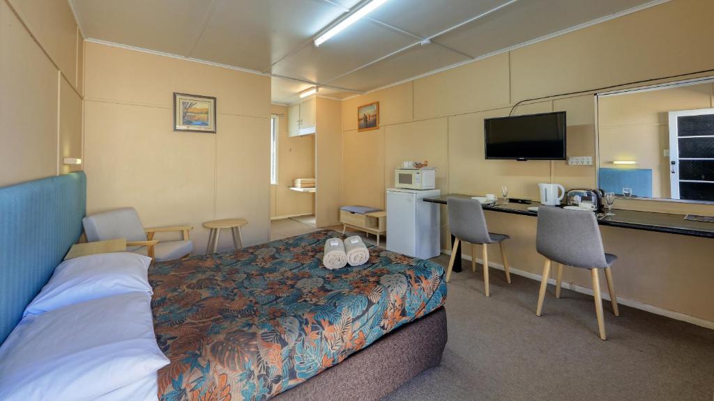 TV a/nebo společenská místnost v ubytování Matilda Motel