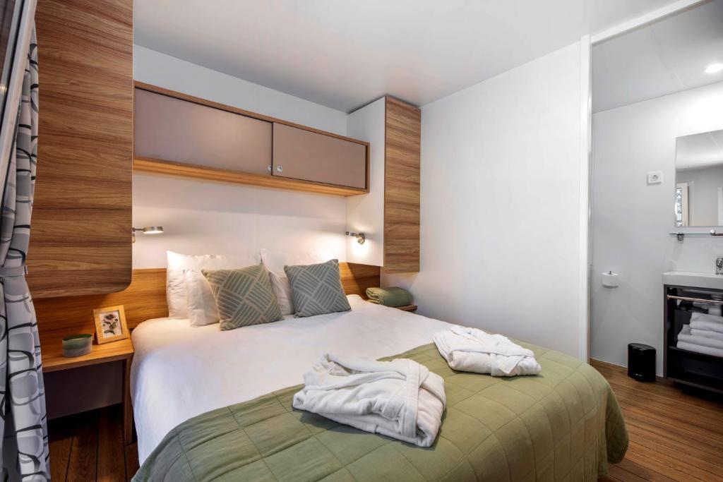 Postel nebo postele na pokoji v ubytování Porton Mobile Home
