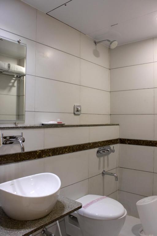 Koupelna v ubytování Hotel Ashray Inn