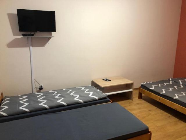 Posteľ alebo postele v izbe v ubytovaní Pokoje Bielsko