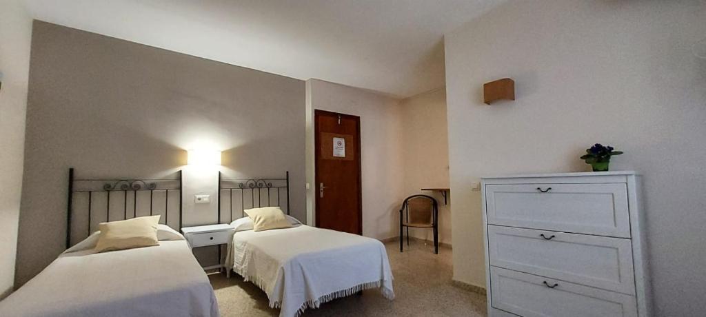Posteľ alebo postele v izbe v ubytovaní Hotel Maeva ,1 star B&B