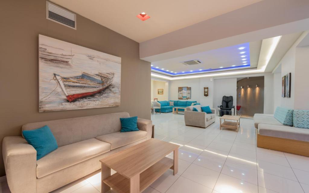 Posezení v ubytování Dennys Inn Hotel