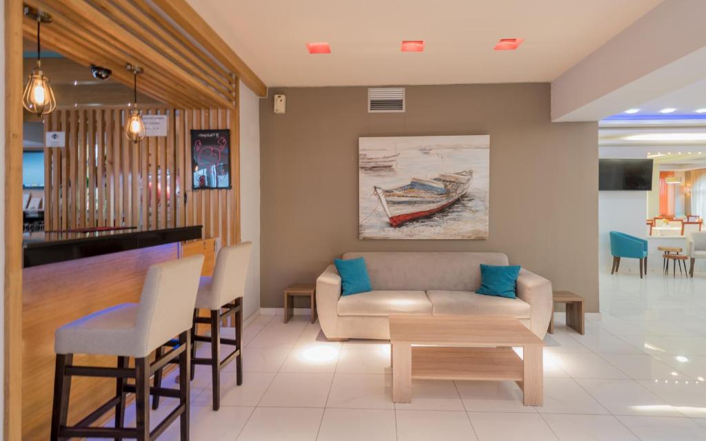Posezení v ubytování Dennys Inn Hotel