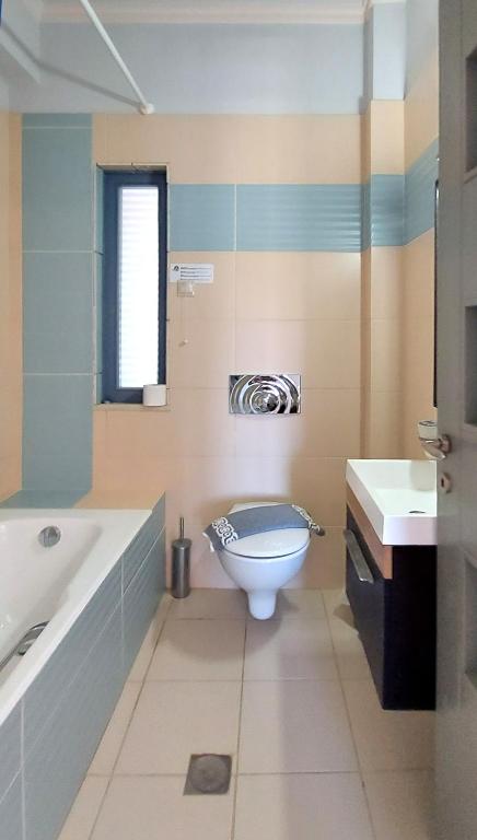 Kúpeľňa v ubytovaní Villa "Thealia", 430 m2 with swimmg pool - sea view