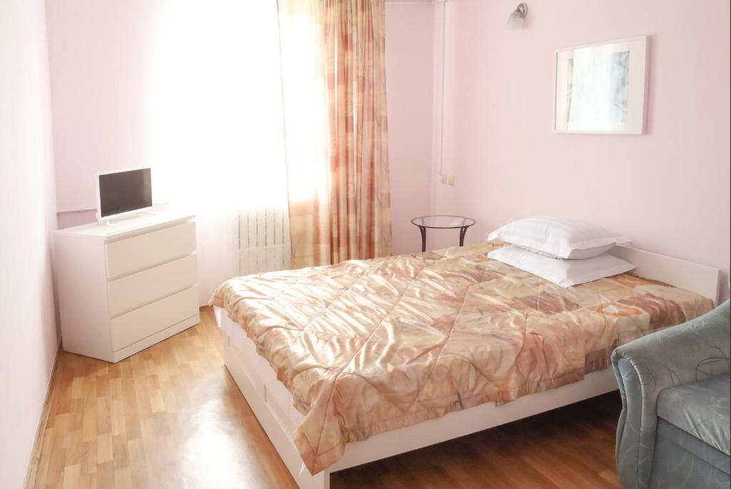 Un pat sau paturi într-o cameră la Guest House Elpida