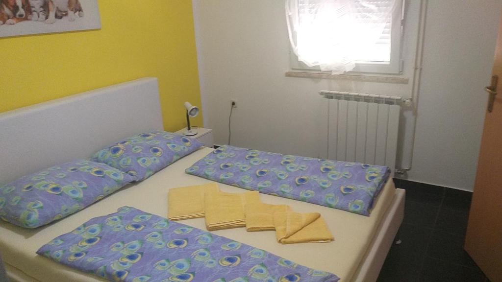 Postel nebo postele na pokoji v ubytování JAN 2