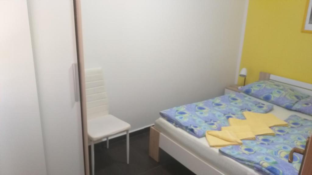 Postel nebo postele na pokoji v ubytování JAN 2